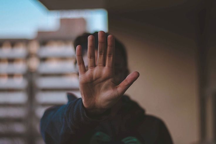 A person learning how to set healthy boundaries without guilt in a conversation